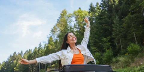 A cheerful person excitedly preparing for an unforgettable spring break adventure in Mexico