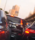 A traffic jam on a busy road in Mexico, with cars lined up and waiting