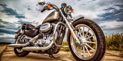 A close-up of a motorcycle, focusing on the details of the bike