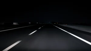 A quiet road in Mexico illuminated by the soft glow of streetlight