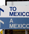 Road sign indicating the way to Mexico