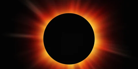 View of a total solar eclipse with the moon completely covering the sun.