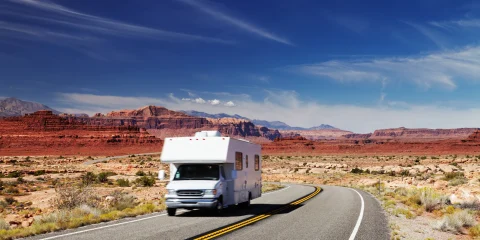 An RV traveling on a scenic road in Mexico